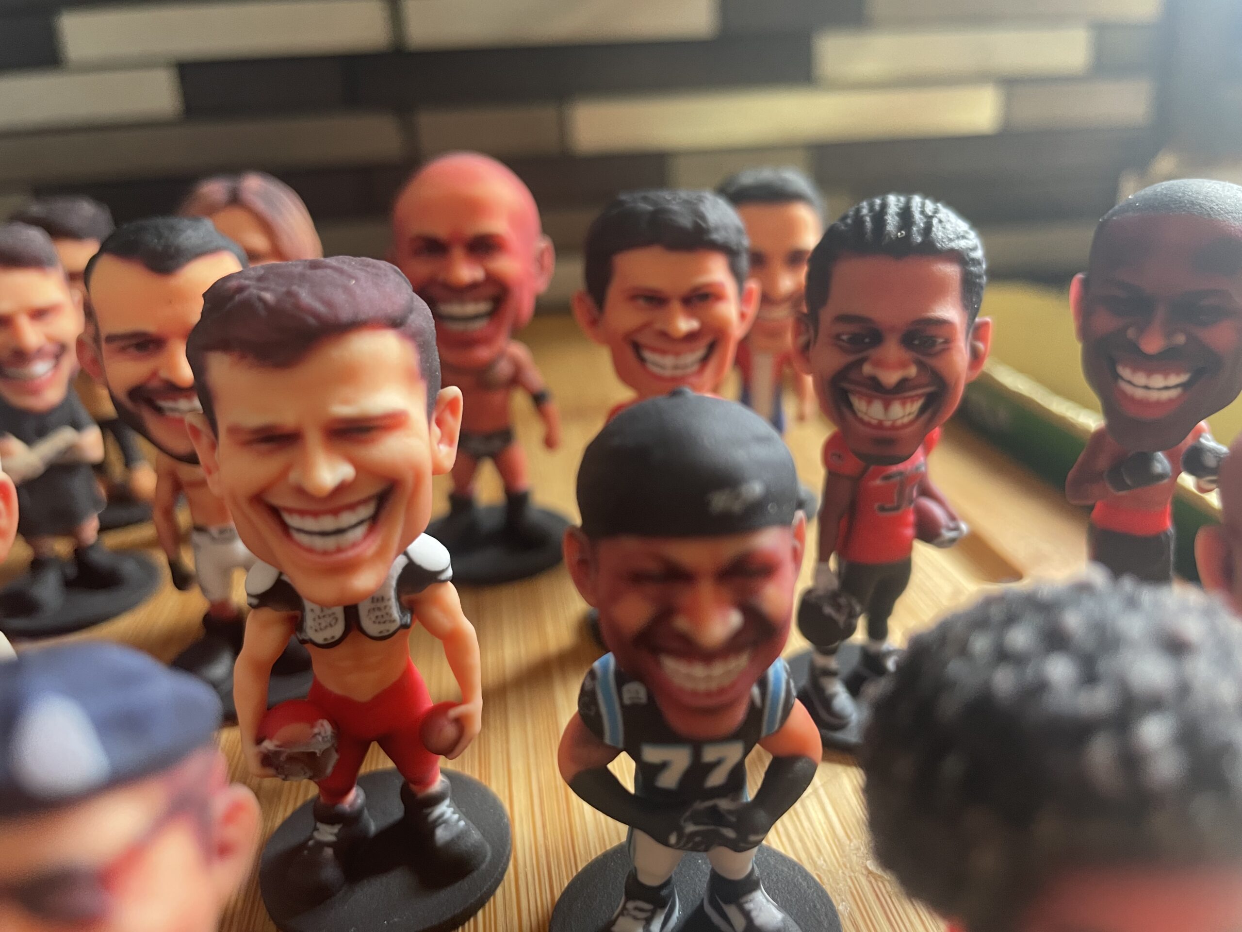 Custom bobblehead figurines in sports jerseys